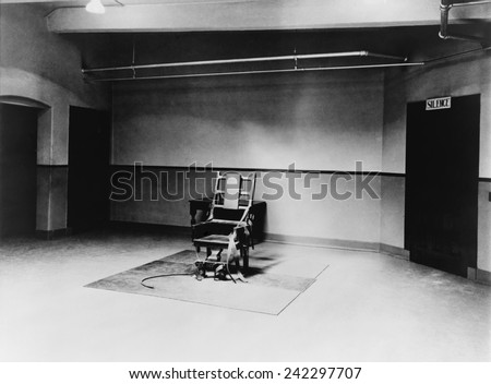 Death chamber and electric chair at Sing Sing Prison in 1923. Royalty-Free Stock Photo #242297707