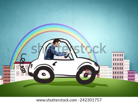 Young funny man driving little drawn car
