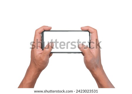 Men hand holding a blank smartphone display by two hands. for game playing.website searching online shopping and entertainment. isolate image for additional user interface.