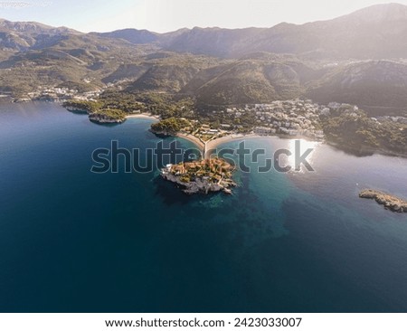 Beautiful shot drone above Sveti Stefan in Adriatic sea, Montenegro, Jadransko more, Crna Gora, Aerial Royalty-Free Stock Photo #2423033007