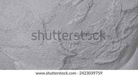 Wet cement mix plaster and stucco material with grain surface background well free space for text presentation