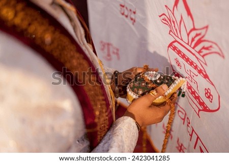 Indian wedding traditional handholding together, Pooja moment.