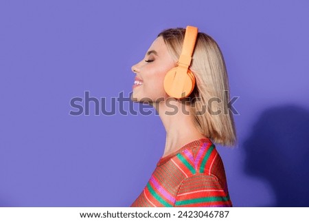 Side photo of young relaxed girl meloman closed eyes comfortable listen jazz music wear headphones isolated on violet color background Royalty-Free Stock Photo #2423046787