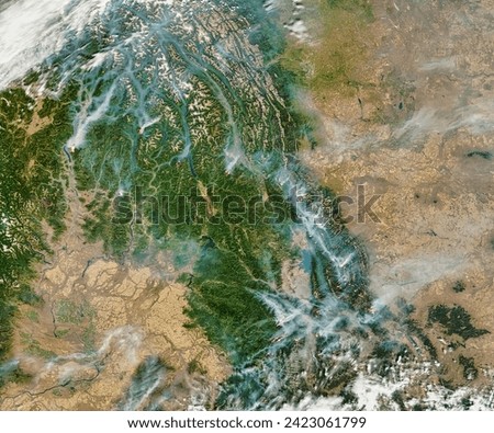 Fires in the Northern Rockies. . Elements of this image furnished by NASA.