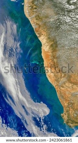 Plankton and Sulfur in the Benguela Current. Ocean currents and nutrientrich waters conspire to create a boon for some ocean species and. Elements of this image furnished by NASA. Royalty-Free Stock Photo #2423061861