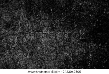 Dark cement wall in retro concept. Black concrete background for wallpaper or graphic design. Blank old plaster texture in vintage style. Abstract surface with unusual beautiful patterns.