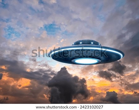 UFO. Alien spaceship among clouds in sky. Extraterrestrial visitors