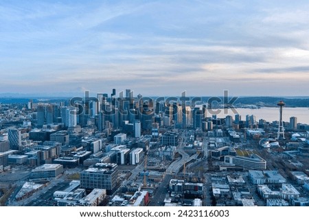 Aerial view of the Seattle skyline and Mount Rainier at sunset