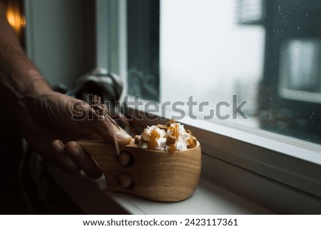 deluxe hot chocolate on a window sill in a Norwegian cabin