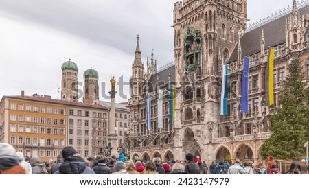 Music show on Clock Tower or Glockenspiel section of bell play timelapse, Munich, Germany. Detail of Rathaus (New Town Hall) with chime in city center. It is landmark located on Marienplatz square Royalty-Free Stock Photo #2423147979
