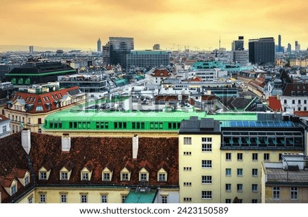 City skyline view of Vienna in Austria from the monastery tower St. Stephen's Cathedral (Stephansdom) with colorful roofs. View over the rooftops of Vienna. Beautiful travel picture.