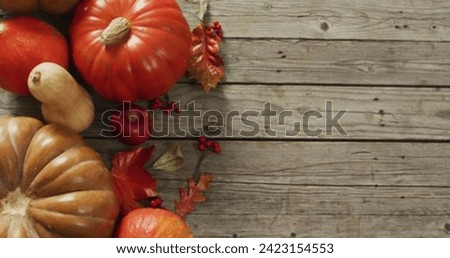 Autumnal Elegant, Thanksgiving Decor with Leaves and Pumpkins on a Dark Background