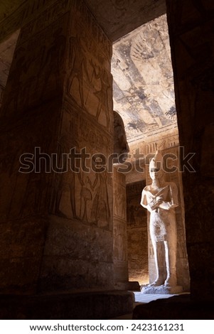 Statue of Ramesses pharao inside a temple of Abu Simbel Royalty-Free Stock Photo #2423161231