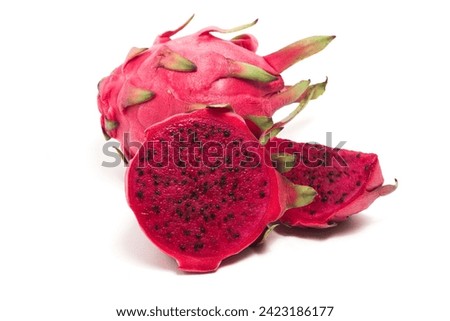 Half cut sliced and whole fresh organic red dragon fruit delicious fruit isolated on white background clipping path