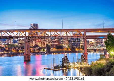 Portland, Oregon. Amazing city night skyline. Bridge over Willamette River and city night lights.