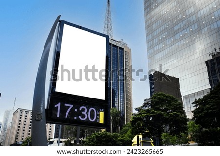 Billboard blank mock up in the city of Sao Paulo. Use this photo day mockup for your outdoor design. Royalty-Free Stock Photo #2423265665