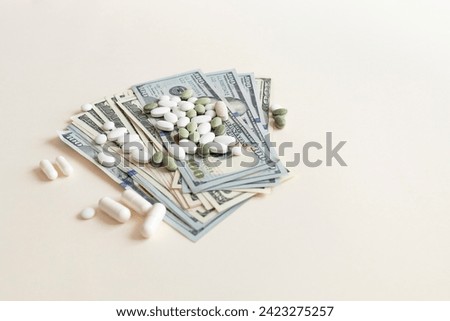 Closeup Many Dollar Money Banknotes And Different Pills Or Tablets. Expensive Medicine And Healthcare Insurances. Inflation. Big Pharma, Pharmaceutical Industry. Horizontal Plane