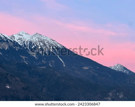 Mountain Stol. Highest peak of Karavanke. With beautiful pink evening sky Royalty-Free Stock Photo #2423306847