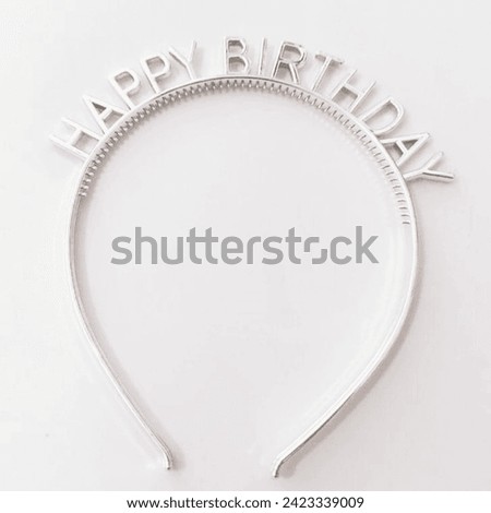The head band is made of titanium with a very sweet happy birthday greeting
