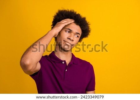 Photo of sick disappointed guy wear burgundy outfit arm touch head suffer migraine look empty space isolated on yellow color background Royalty-Free Stock Photo #2423349079