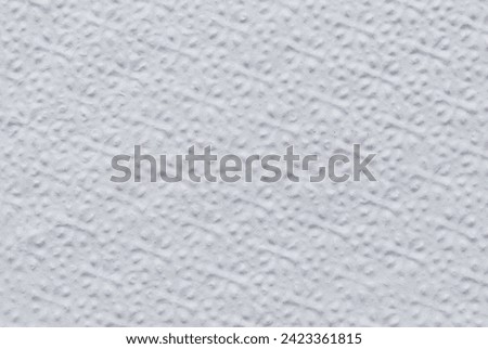A sheet of white structured white tissue paper as background