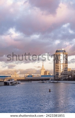 Bagrationovsky bridge against the background of a beautiful sunset sky with clouds. Moscow. Russia