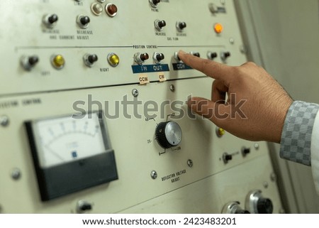 Control Panel of a Cyclotron Particle Accelerator Royalty-Free Stock Photo #2423483201