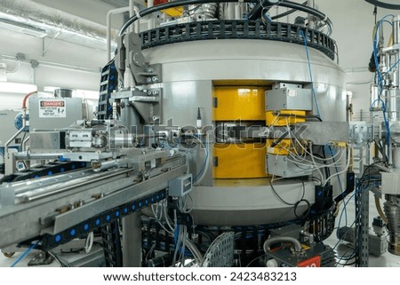 Control Panel of a Cyclotron Particle Accelerator Royalty-Free Stock Photo #2423483213