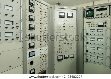 Control Panel of a Cyclotron Particle Accelerator Royalty-Free Stock Photo #2423483227