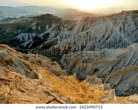 The Calanchi di Atri, in Abruzzo, also known as "Dante's Bolge", constitute the most evocative and spectacular form of the Adriatic hilly landscape, real natural sculptures similar to the lunar landsc Royalty-Free Stock Photo #2423490713