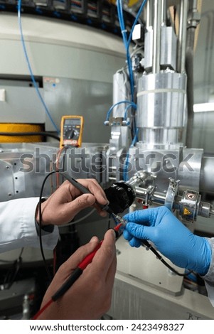 Control Panel of a Cyclotron Particle Accelerator Royalty-Free Stock Photo #2423498327