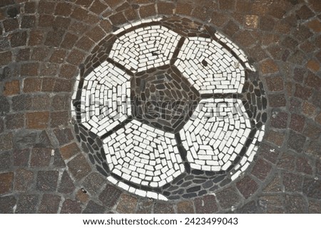 Soccer ball, a stone mosaic in front of a shop, Freiburg, Baden-Wuerttemberg, Germany, Europe