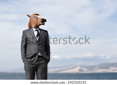 Horse Head Businessman Royalty-Free Stock Photo #242350135