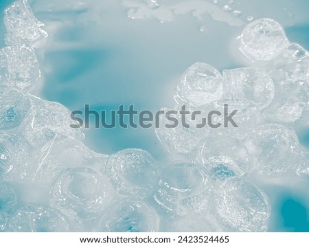 icecubes background,icecubes texture,icecubes wallpaper,ice helps to feel refreshed and cool water from the icecubes helps the water refresh your life and feel good.ice drinks for refreshment business Royalty-Free Stock Photo #2423524465