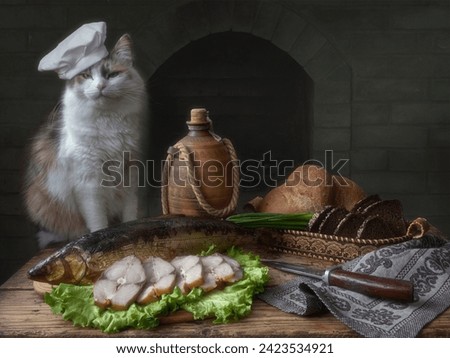 Still life with smoked fish and curious kitty