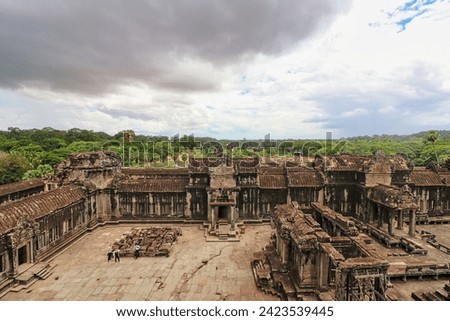View of Angkor wat inner courtyard from the top of the Shrine, a UNESCO world heritage monumnet in Siem Reap, Cambodia Royalty-Free Stock Photo #2423539445