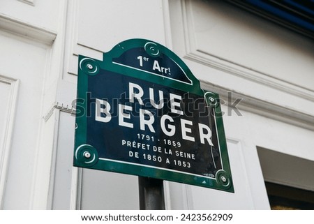 Paris Green Street sign on wall