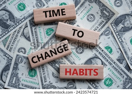 Time to Change Habits symbol. Wooden blocks with words Time to Change Habits. Beautiful dollar background. Psychology and Time to Change Habits concept. Copy space.