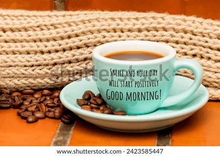  Mug of coffee, grains. Smile and your day will start positively. Good morning.