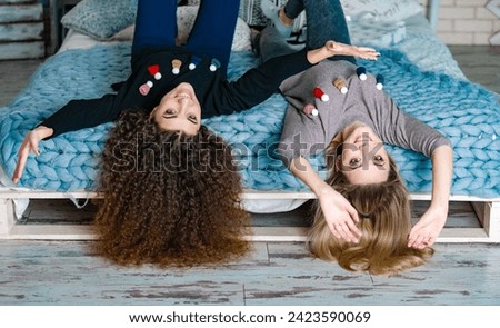 Funny beautiful ladies having fun together. Female friends lifestyle portrait.