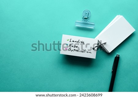 There is word card with the word Landing Page Optimization. It is as an eye-catching image. Royalty-Free Stock Photo #2423608699