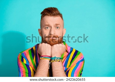 Photo of attractive sad man wear trendy clothes two arm under chin bad mood problem trouble isolated on cyan color background