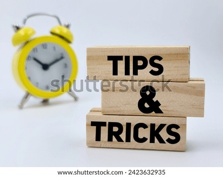 "Tips and tricks" written over wooden blocks 