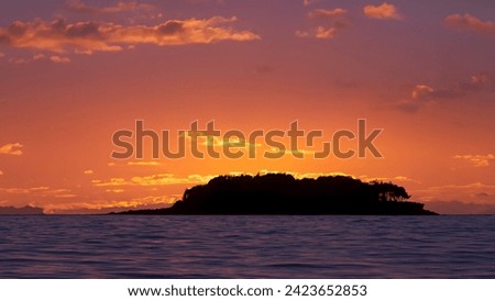 Background sunset red sky with island. This picture can be as background on your video and poster or short video