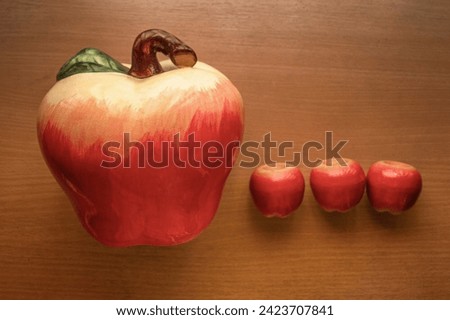 Four showpieces of apple fruit. Royalty-Free Stock Photo #2423707841