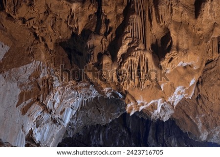 A large dome of an extensive cave system with rich stalactite and stalagmite decoration.