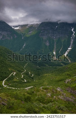 The scenic route of Gaularfjellet where the road twists and turns through nine hairpin bends, offeing jaw-dropping scenery. The stop at Utsikten allows travelers to view the scenery.  Royalty-Free Stock Photo #2423751517