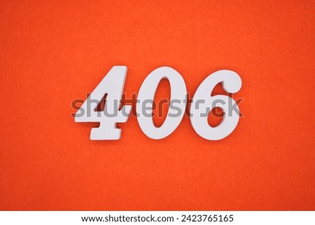 Orange felt is the background. The numbers 406 are made from white painted wood.