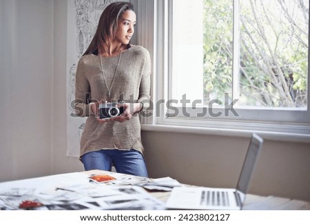 Woman, photographer and vintage camera or thinking for creative images in portfolio or art project, proposal or career. Female person, equipment and pictures with laptop for retro, hobby or prints