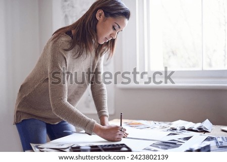 Graphic designer, business woman and drawing on paper at desk with ruler for project in startup. Serious, creative and artist at table with sketch, planning or professional work on art with pencil